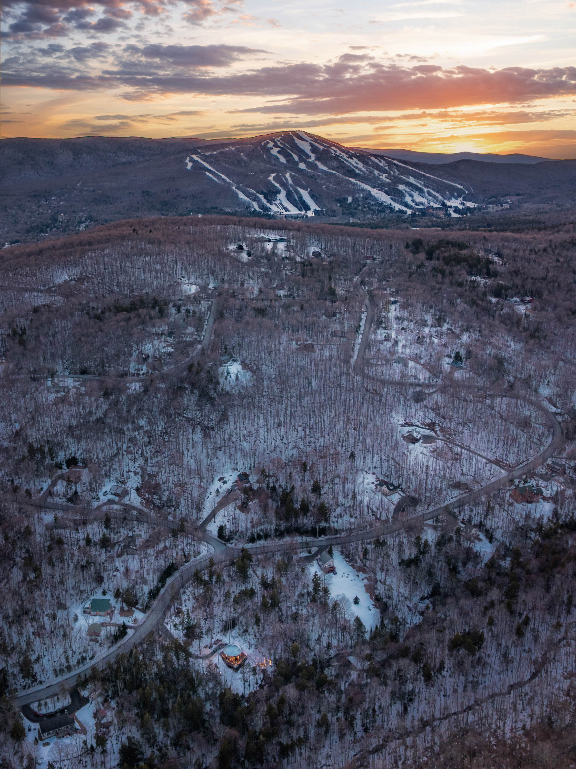 <span class="uc_style_uc_tiles_grid_image_elementor_uc_items_attribute_title" style="color:#ffffff;">54. Stunning Aerial Sunset View of Mount Snow Ski Resort Showing Yurt Proximity, with Hot Tub, Sauna, Starlink, EV Charger - Mount Snow Yurt</span>