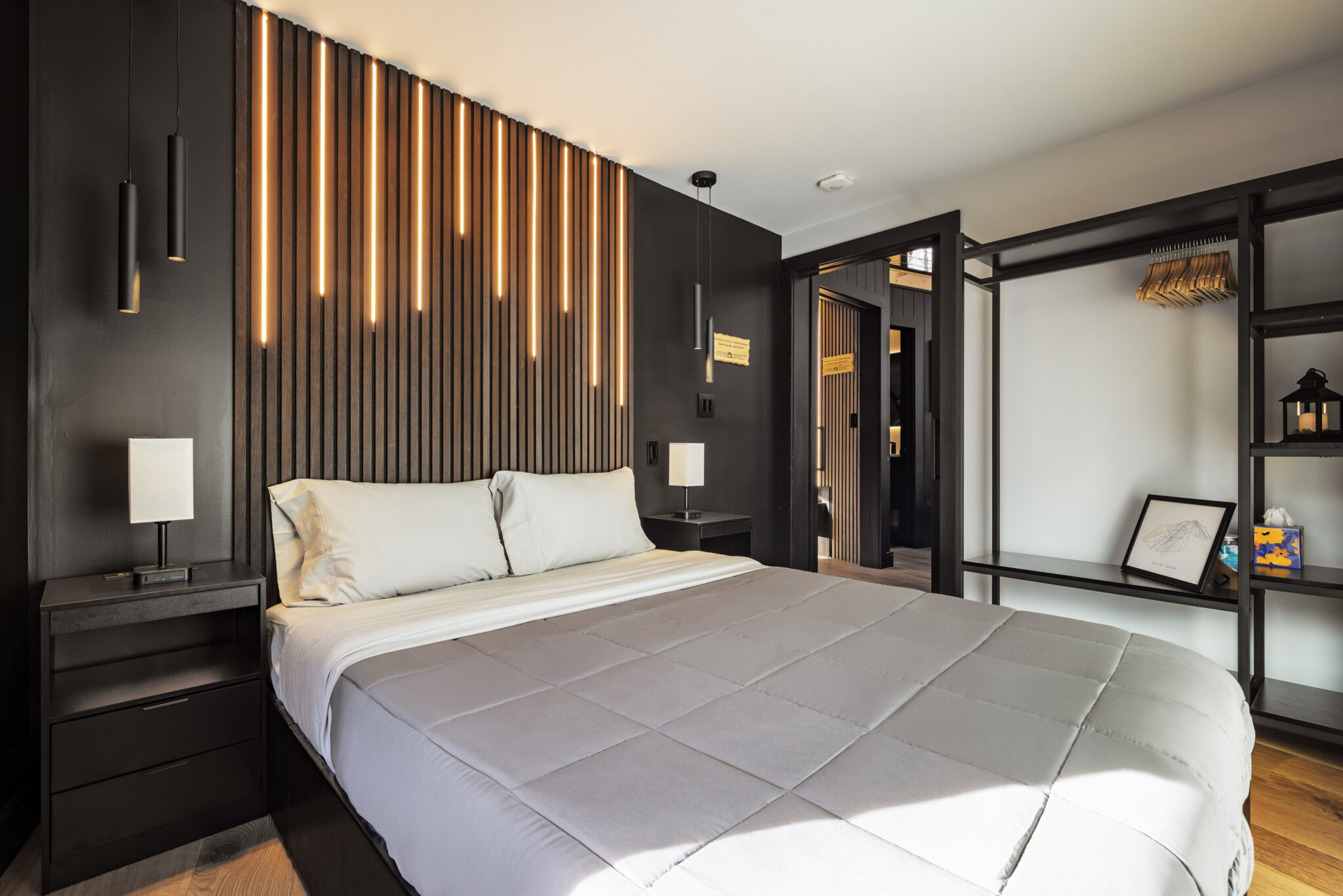Bedroom 2 with queen bed, LED waterfall light wall, black nightstands, USB-C ports and mirror closet system - Mount Snow Yurt