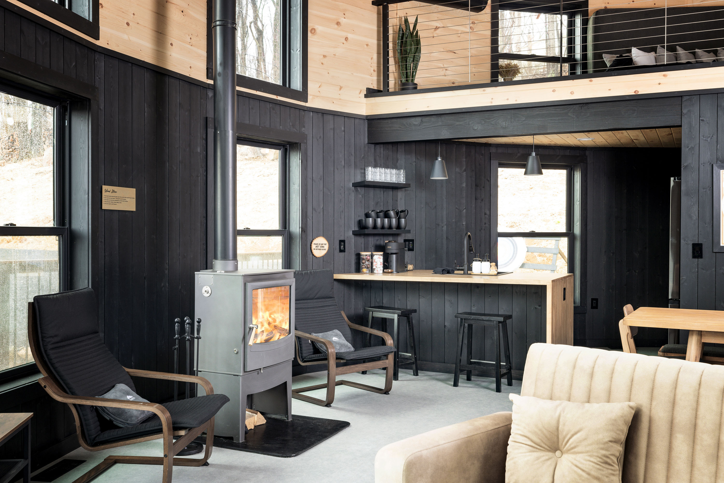 <span  class="uc_style_uc_tiles_grid_image_elementor_uc_items_attribute_title" style="color:#ffffff;">Lounger Chairs, Wood Stove, Kitchen Island, Modern Black-Yellow Interior, Sofa - Mount Snow Yurt</span>