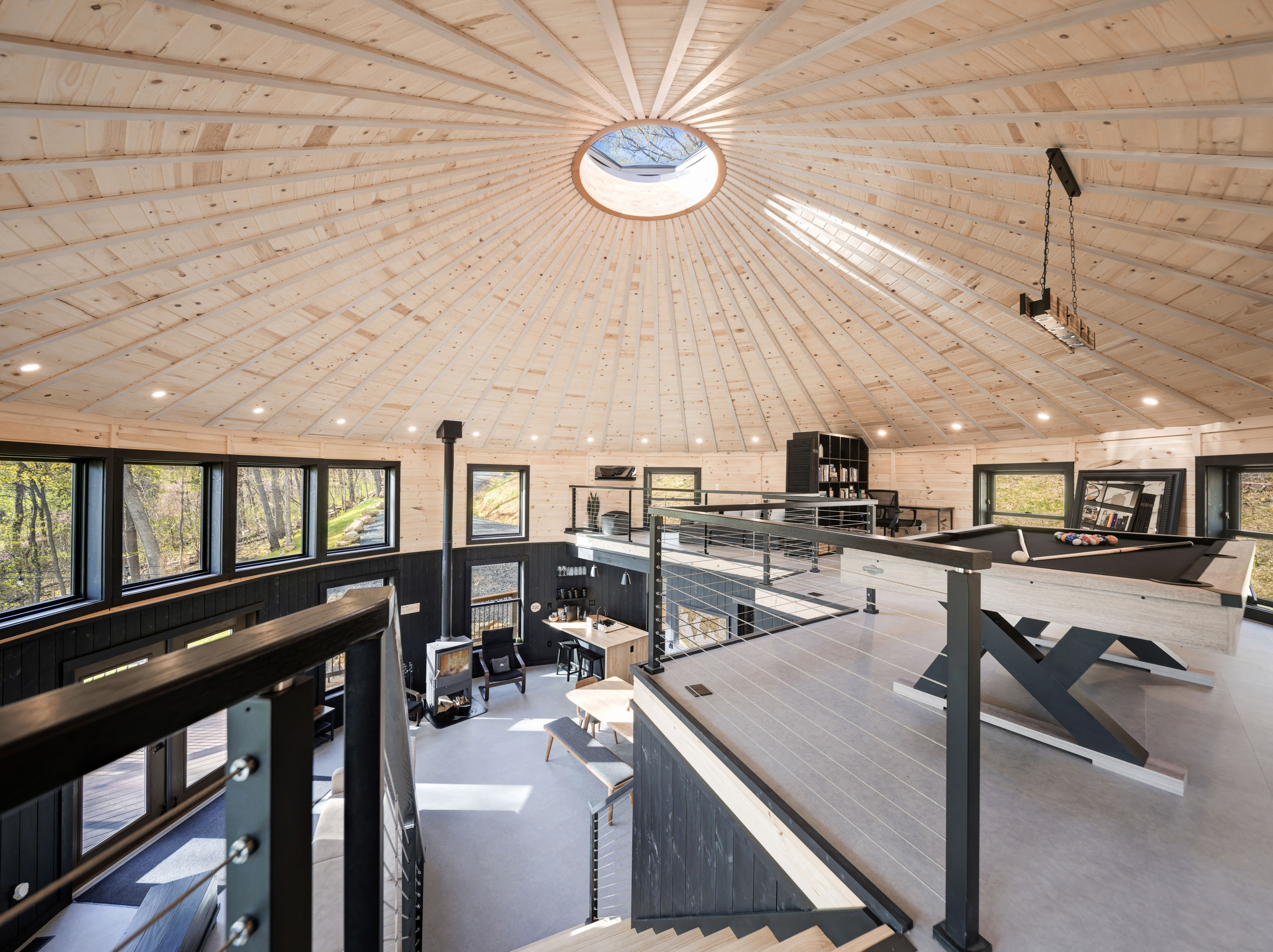 <span  class="uc_style_uc_tiles_grid_image_elementor_uc_items_attribute_title" style="color:#ffffff;">View from Stairs, Pool Table, Yurt Ceiling, Bookshelf, Wood Stove, Lounge Chairs - Mount Snow Yurt</span>